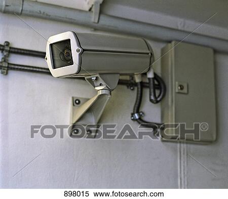 A video surveillance camera View Large Photo Image Stock Photography - A video surveillance camera. Fotosearch