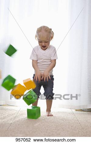 A young girl playing with toy blocks Stock Image | 957052 ...