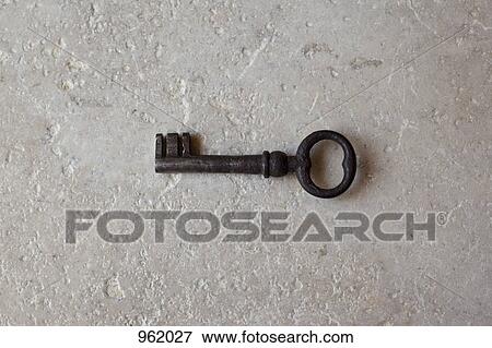 An old key View Large Photo Image Stock Photo - An old key. Fotosearch