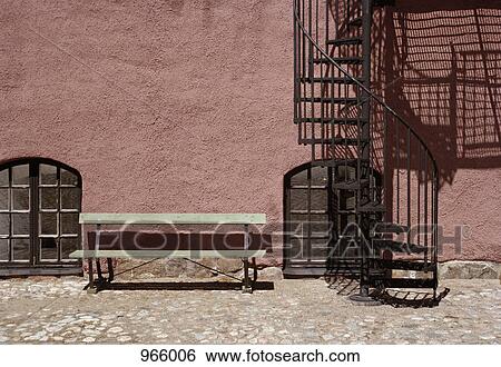 Bench and spiral staircase View Large Photo Image Stock Photograph - Bench and spiral staircase . Fotosearch