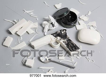 Black shoe polish on a gun made from soap View Large Photo Image Stock Image - Black shoe polish on a gun made from soap. Fotosearch