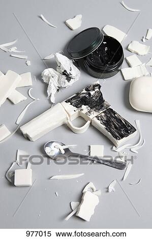 Black shoe polish on a gun made from soap View Large Photo Image Stock Photography - Black shoe polish on a gun made from soap. Fotosearch