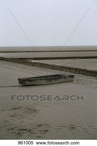 Boat stuck on beach shore View Large Photo Image Stock Photography - Boat stuck on beach shore . Fotosearch