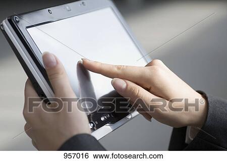 Close-up of tablet computer View Large Photo Image Stock Photograph - Close-up of tablet computer. Fotosearch