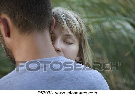 Couple embracing View Large Photo Image Stock Image - Couple embracing . Fotosearch