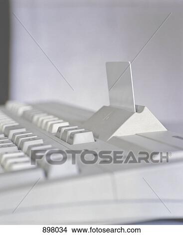 Detail of a keyboard and card reader View Large Photo Image Picture - Detail of a keyboard and card reader. Fotosearch