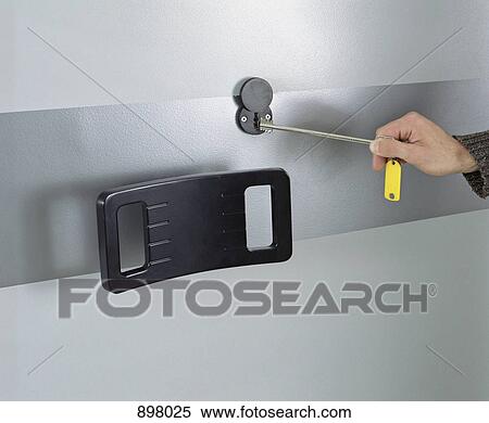 Detail of a man opening a safe with a key View Large Photo Image Stock Photography - Detail of a man opening a safe with a key. Fotosearch