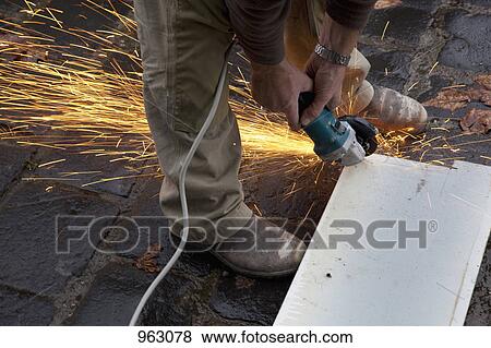 Detail of a man using a circular saw View Large Photo Image Stock Photo - Detail of a man using a circular saw. Fotosearch