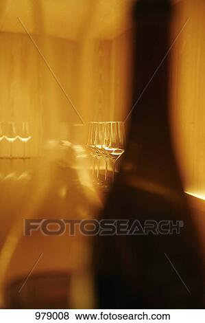 Detail of bottles and wine glasses View Large Photo Image Stock Photo - Detail of bottles and wine glasses. Fotosearch