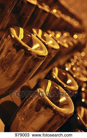 Detail of bottles of champagne in a rack View Large Photo Image Stock Image - Detail of bottles of champagne in a rack. Fotosearch