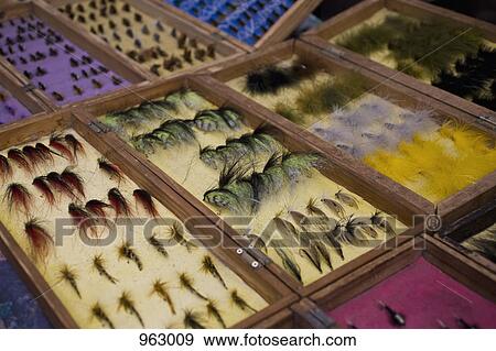 Stock Photo - Detail of fishing lures in display cases. Fotosearch