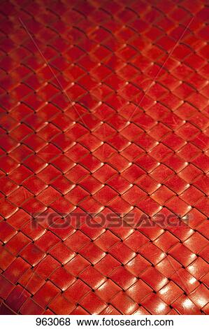 Stock Photo - Detail of woven red leather. Fotosearch