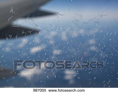 Frost on the window of an airplane View Large Photo Image Stock Photography - Frost on the window of an airplane. Fotosearch