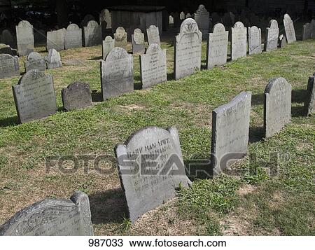 Stock Image - Gravestones in an old cemetery. Fotosearch
