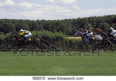 Stock Image - Horse racing. Fotosearch