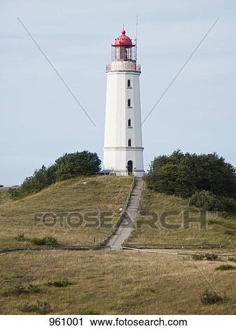 Stock Image - Lighthouse on hill. Fotosearch