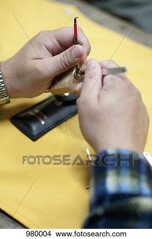 Lock picking a padlock close up View Large Photo Image Picture - Lock picking a padlock close up. Fotosearch