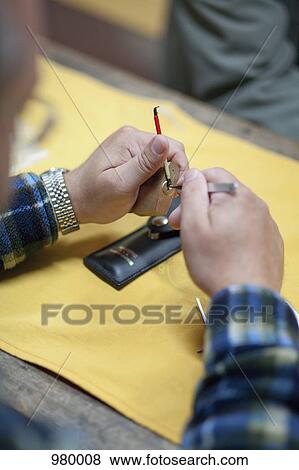 Stock Photo - Lock picking a padlock . Fotosearch