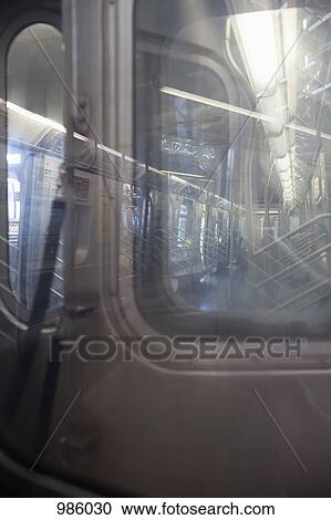 Looking through the window of a subway car View Large Photo Image Stock Image - Looking through the window of a subway car. Fotosearch