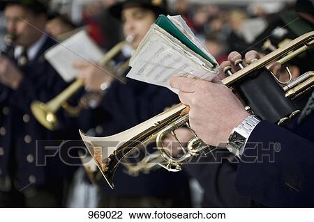 Person playing a trumpet in a marching band View Large Photo Image Stock Image - Person playing a trumpet in a marching band. Fotosearch