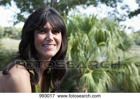 Portrait of a mature woman, outdoors View Large Photo Image Stock Photo - Portrait of a mature woman, outdoors. Fotosearch