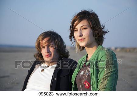 Portrait of a young couple at the beach View Large Photo Image Stock Image - Portrait of a young couple at the beach. Fotosearch