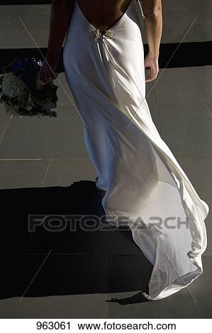 Stock Image - Rear view detail of a bride. Fotosearch