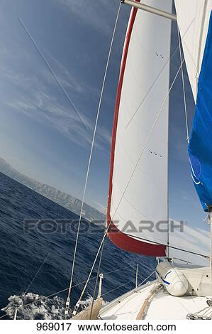 Stock Photo - Sailboat, view from the helm. Fotosearch