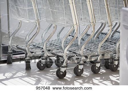 Shopping carts, low section View Large Photo Image Stock Photo - Shopping carts, low section. Fotosearch