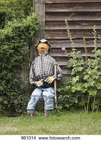 Sitting scarecrow View Large Photo Image Picture - Sitting scarecrow. Fotosearch