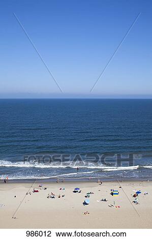 Sunbathers at Virginia Beach, Virginia, USA View Large Photo Image Stock Image - Sunbathers at Virginia Beach, Virginia, USA. Fotosearch