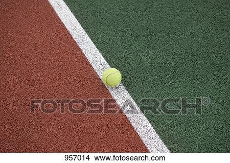 Tennis ball on the line close-up View Large Photo Image Picture - Tennis ball on the line close-up. Fotosearch