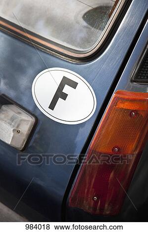 The car country tag for France (letter F) on a car, close-up View Large Photo Image Stock Photo - The car country tag for France (letter F) on a car, close-up. Fotosearch