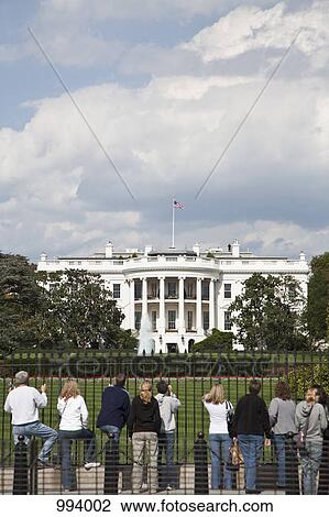 Stock Image - Tourists outside of the White House, Washington DC, USA. Fotosearch