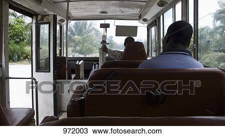 Two men on a bus View Large Photo Image Stock Image - Two men on a bus. Fotosearch