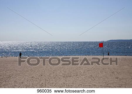 Two people in the distance of an otherwise deserted beach View Large Photo Image Stock Photography - Two people in the distance of an otherwise deserted beach. Fotosearch