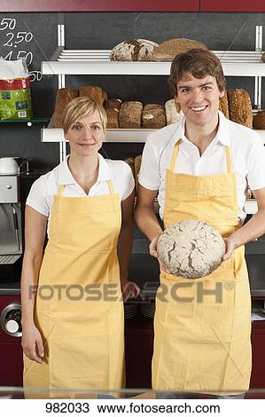 Two sales clerks in a bakery cafe View Large Photo Image Stock Image - Two sales clerks in a bakery cafe. Fotosearch