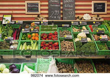 Vegetable section of a supermarket View Large Photo Image Picture - Vegetable section of a supermarket. Fotosearch