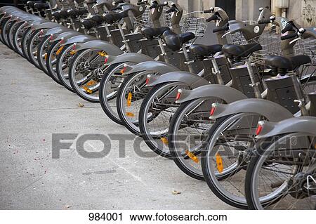 Stock Image - Velib bicycles in Paris, France. Fotosearch