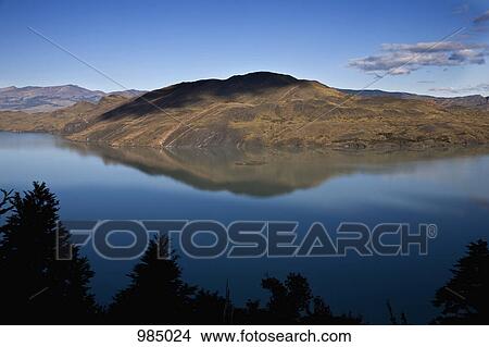 View of a lake and mountains, Torres del Paine National Park, Chile View Large Photo Image Picture - View of a lake and mountains, Torres del Paine National Park, Chile. Fotosearch