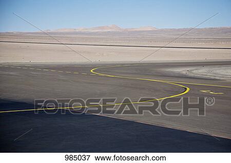Stock Photo - View of an airport tarmac in the Atacama Desert, Chile. Fotosearch