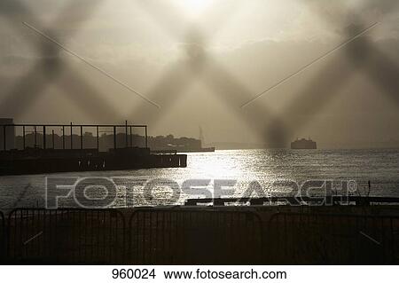 Picture - View of the New York Harbor and the Statue of Liberty in the distance. Fotosearch