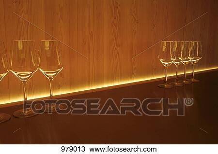Wine glasses on a counter top View Large Photo Image Stock Image - Wine glasses on a counter top. Fotosearch
