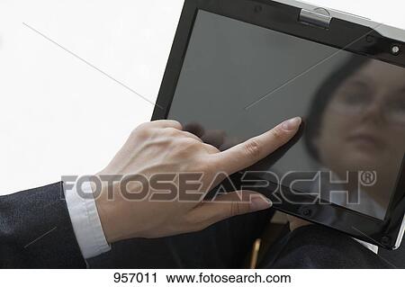 Woman reflected on tablet computer View Large Photo Image Stock Image - Woman reflected on tablet computer. Fotosearch