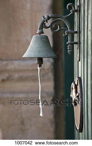 A bell on a wall View Large Photo Image Stock Image - A bell on a wall. Fotosearch