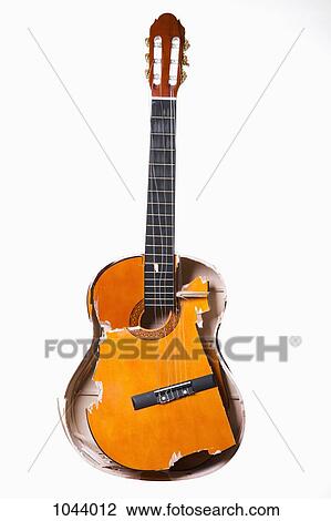 A broken acoustic guitar View Large Photo Image Stock Image - A broken acoustic guitar. Fotosearch