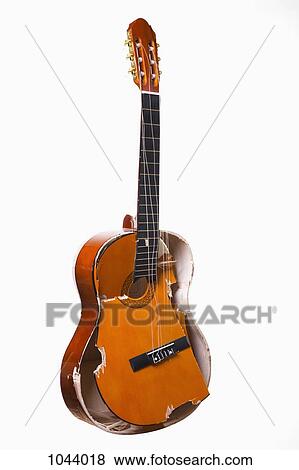 A broken acoustic guitar View Large Photo Image Stock Photo - A broken acoustic guitar. Fotosearch