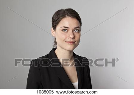 A businesswoman looking to the side contemplatively View Large Photo Image Stock Photography - A businesswoman looking to the side contemplatively. Fotosearch