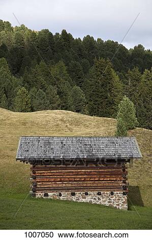 A cabin in a field View Large Photo Image Stock Image - A cabin in a field. Fotosearch