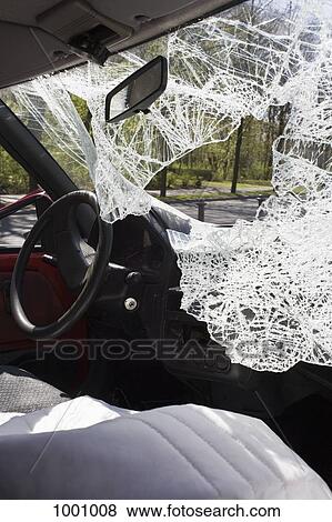 A car with a shattered windshield View Large Photo Image Stock Photo - A car with a shattered windshield. Fotosearch